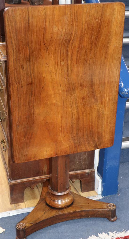 An early Victorian rosewood centre table of rectangular form on pillar and platform base W.68cm